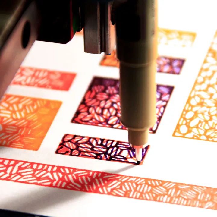 Detail view of the pen plotter drawing purple hexagons filled with a randomly rotated hatching pattern on top of a previously drawn red rectangle.