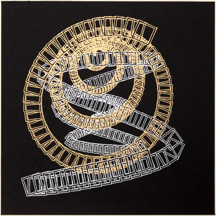 A gold spiral and a silver curl trailed by squares in gold and silver metallic pens on a square black card.